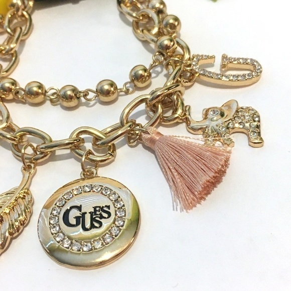 3/$29! GUESS Charm Bracelet Tassel, Elephant, Leaf - Picture 6 of 7